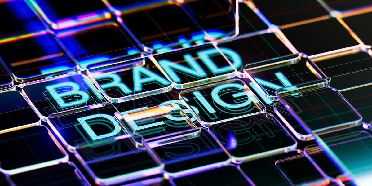 Écran d'ordinateur affichant les mots 'brand design', symbolisant le travail visuel
